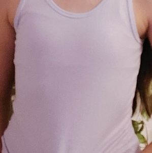 A sparkly purple tank top